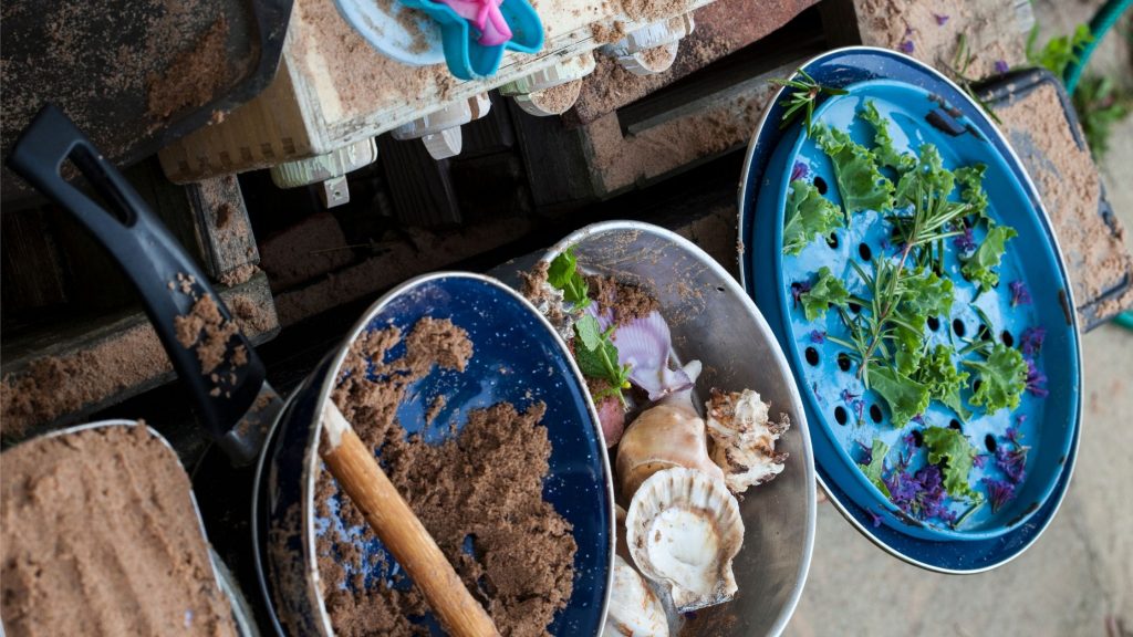 mud kitchen and loose parts natural toys