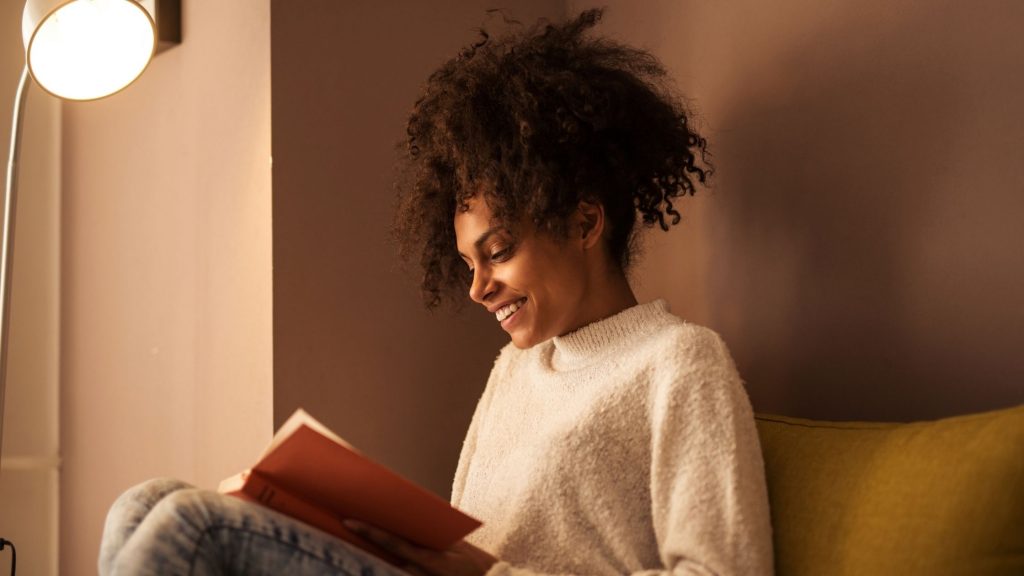woman reading from TBR List